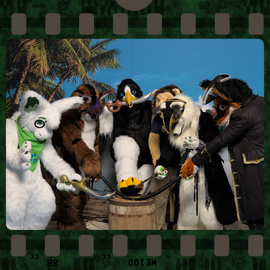 Eurofurence 2022 fursuit photoshoot. Preview picture of Benedict, Fanox, Manic Black, …